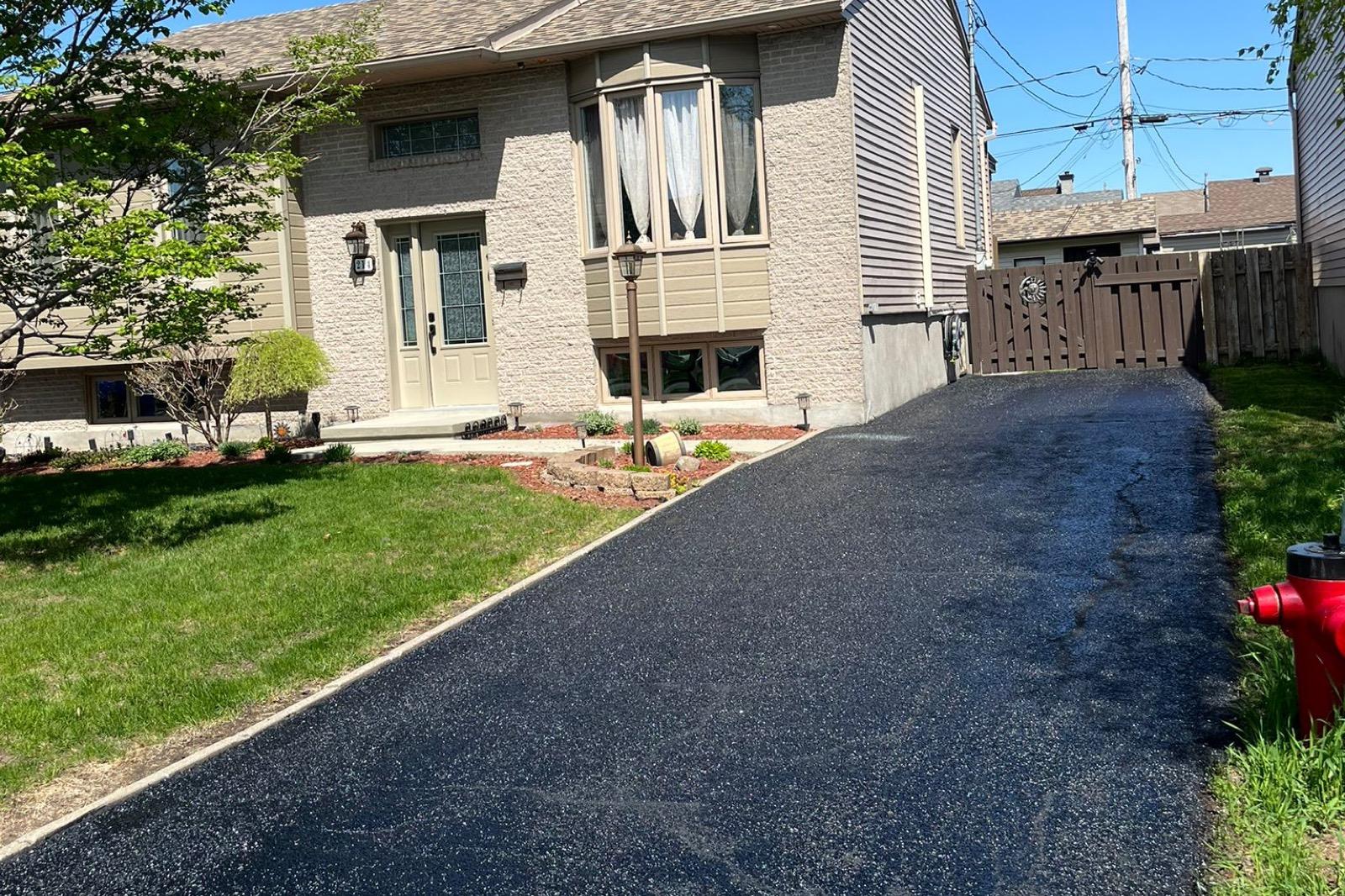 Asphalt path brought back to life with sealant — After