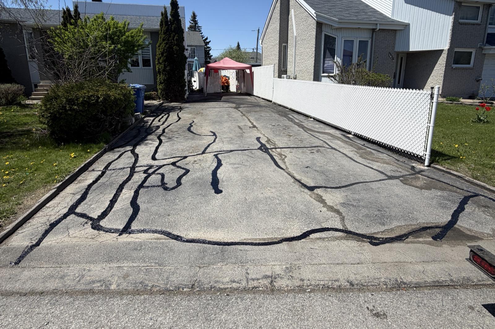 Crack filling and sealcoating — complete protection — Before